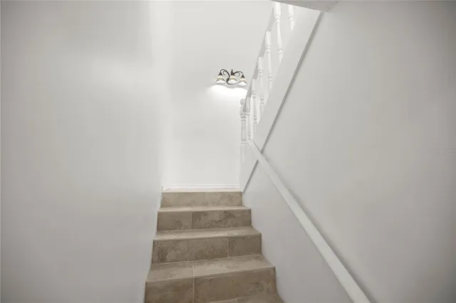 a view of staircase with white walls and white walls