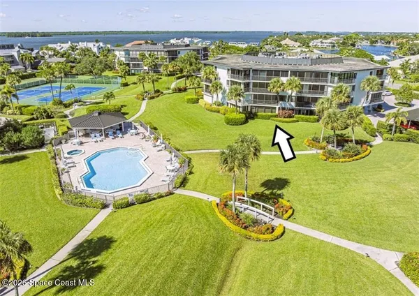 a view of swimming pool with outdoor seating