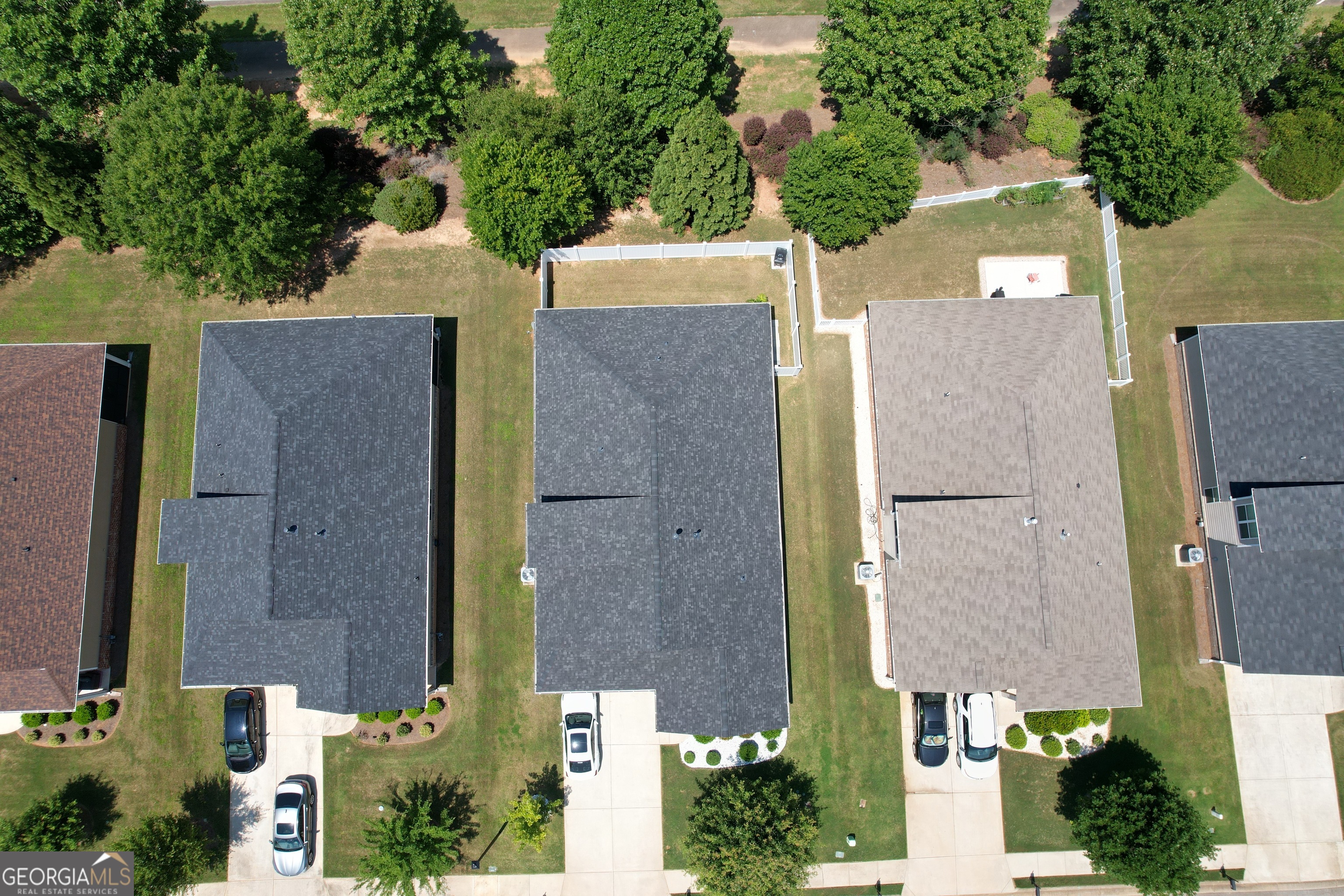 565 Carleton Place Locust Grove, GA 30248 - Photo 14 of 40 an aerial view of a house with a yard