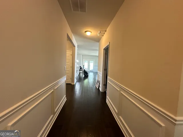 a view of hallway with stairs