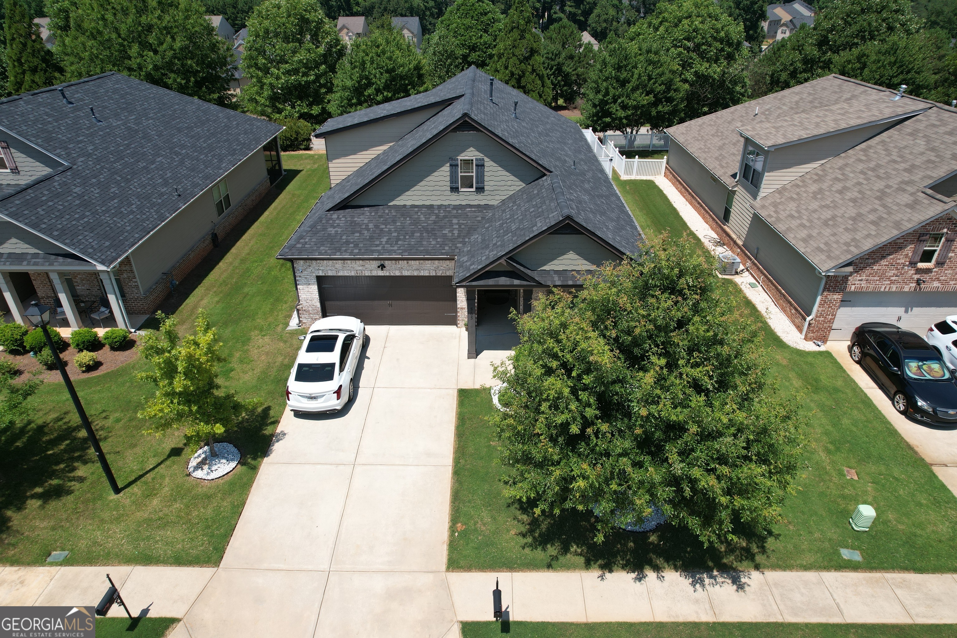 565 Carleton Place Locust Grove, GA 30248 - Photo 3 of 40 a aerial view of a house with a yard