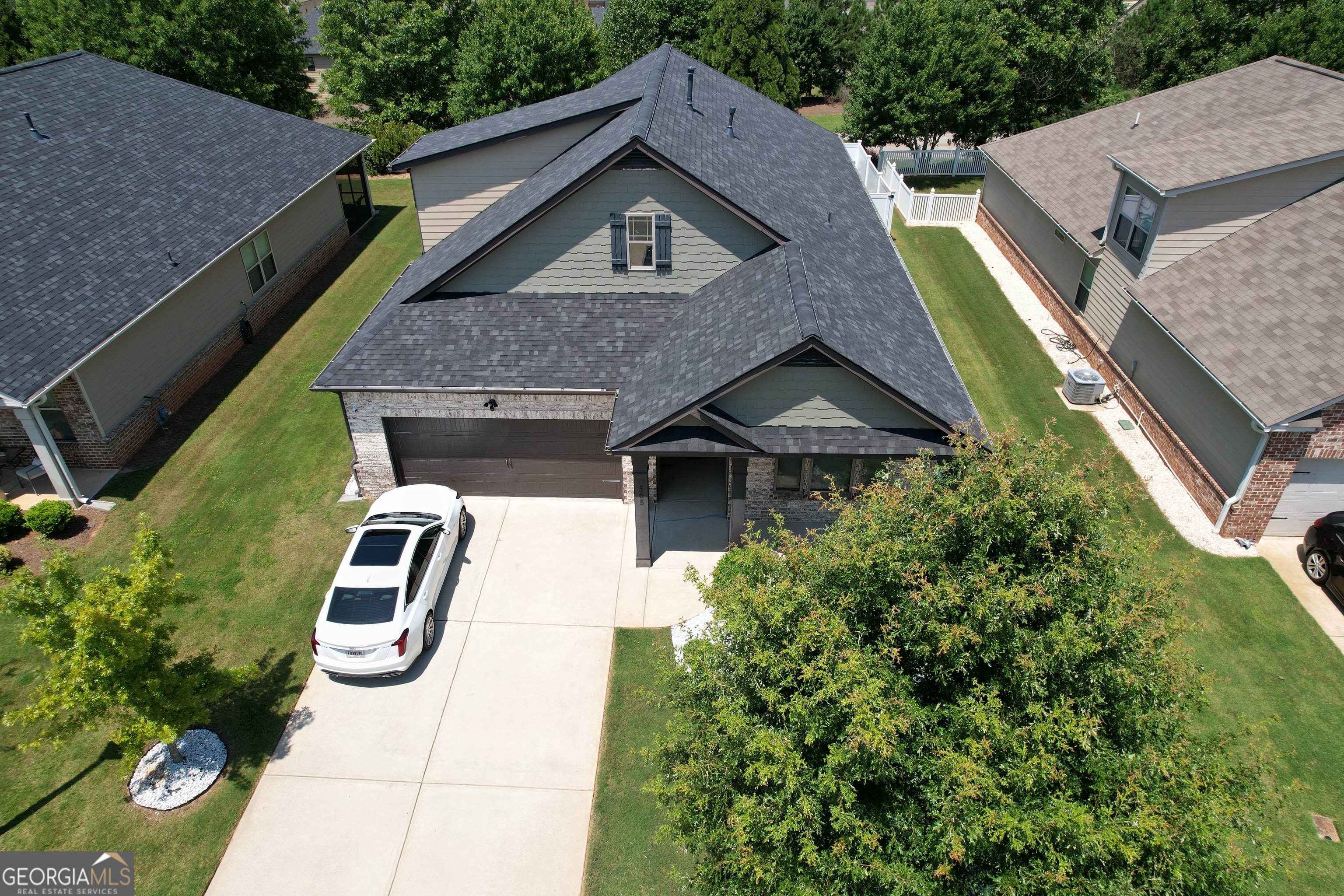 565 Carleton Place Locust Grove, GA 30248 - Photo 4 of 40 a aerial view of a house with a yard