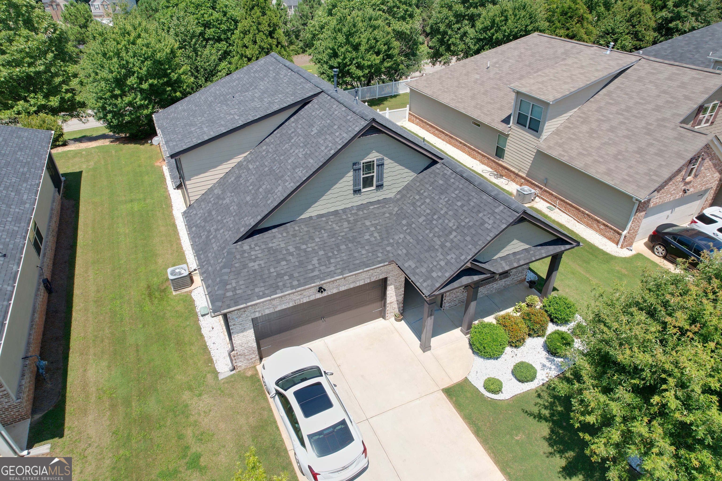 565 Carleton Place Locust Grove, GA 30248 - Photo 5 of 40 an aerial view of a house with a yard