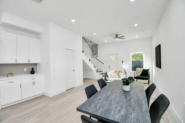 a front view of a house with mountain view