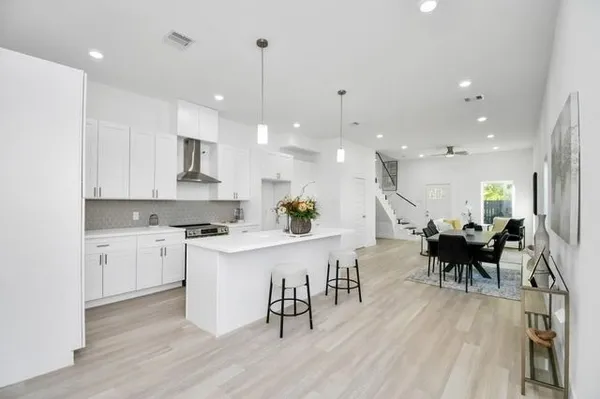 a kitchen with counter top space and appliances