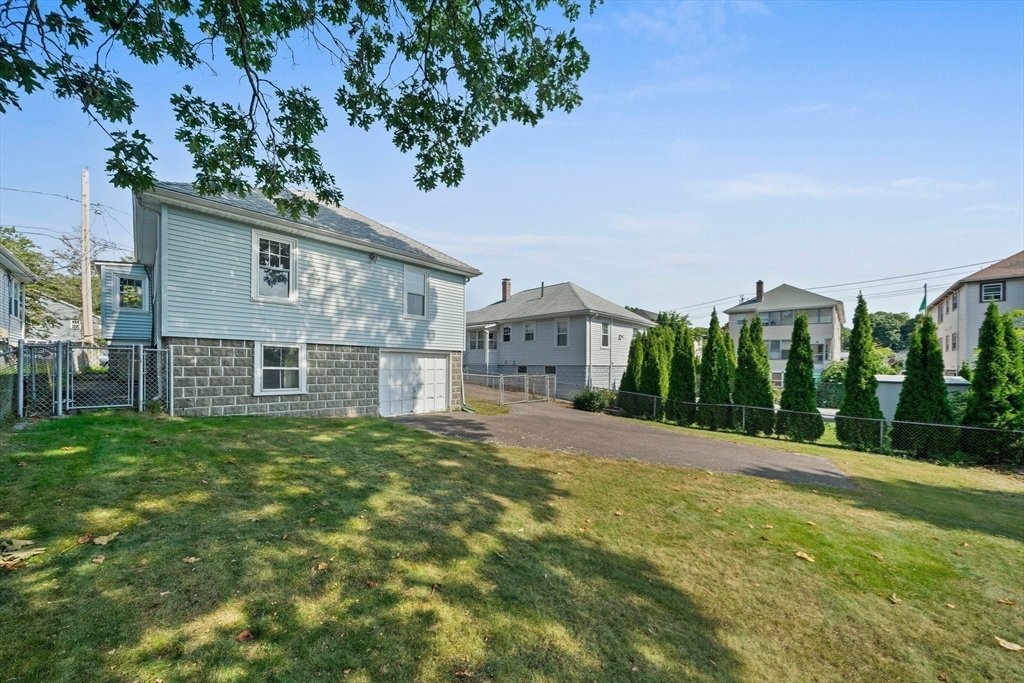 12 Cotuit Street Boston, MA 02132 - Photo 15 of 19 a house view with a garden space