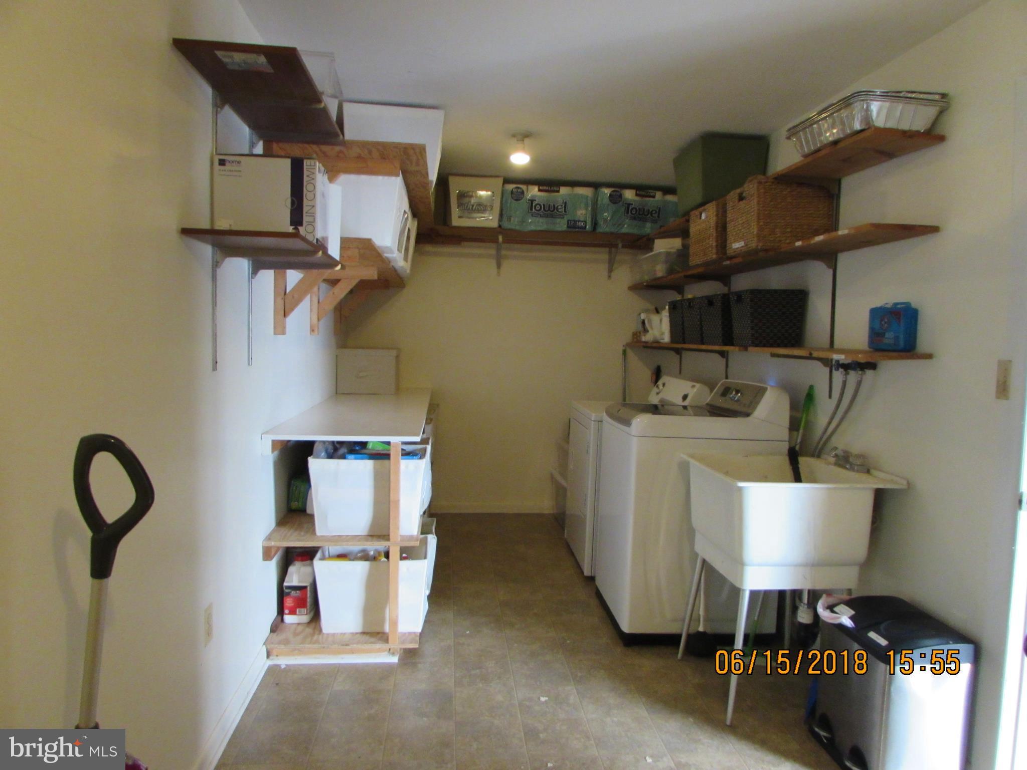 5875 Solomons Island Road Tracys Landing, MD 20779 - Photo 12 of 30 Laundry/Storage