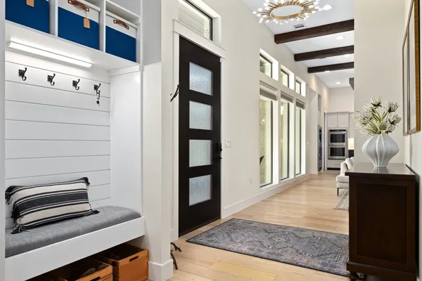 a view of a kitchen with furniture and staircase