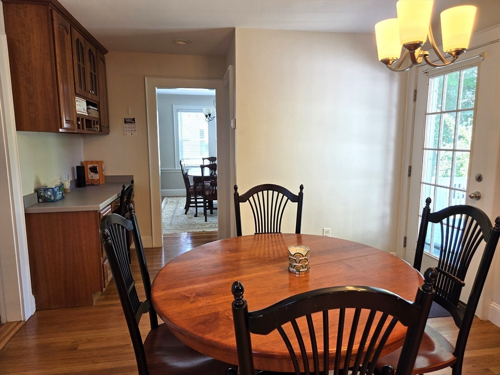 25 Waldeck Road Milton, MA 02186 - Photo 13 of 34 a view of a dining room with furniture