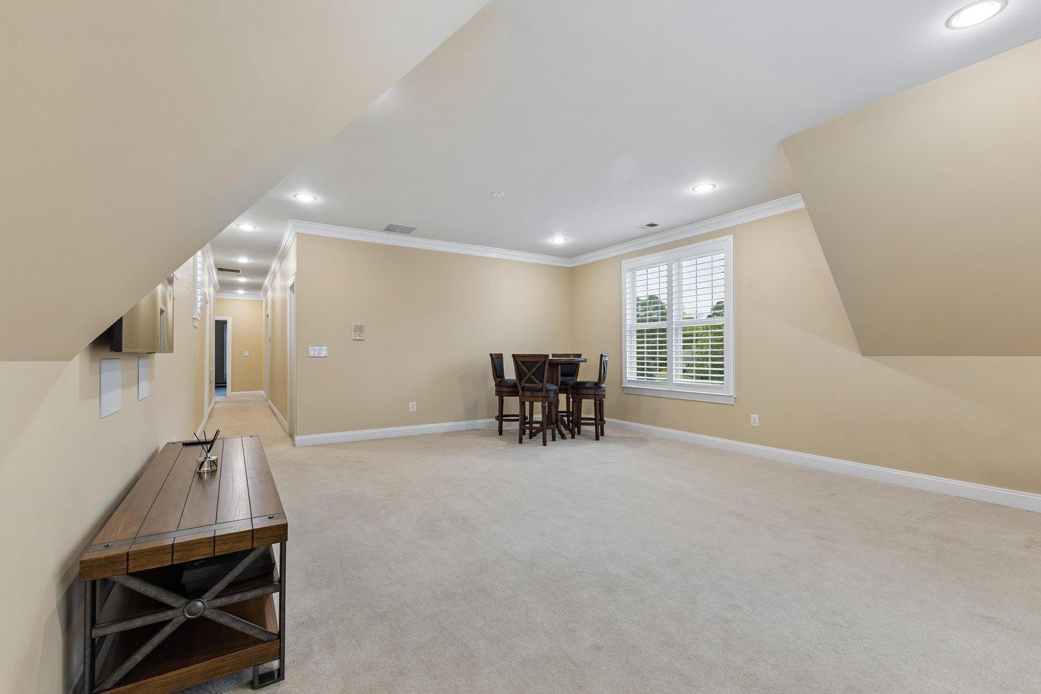 313 Wye Road Queenstown, MD 21658 - Photo 89 of 132 Spacious, sunlit game room with elegant details.