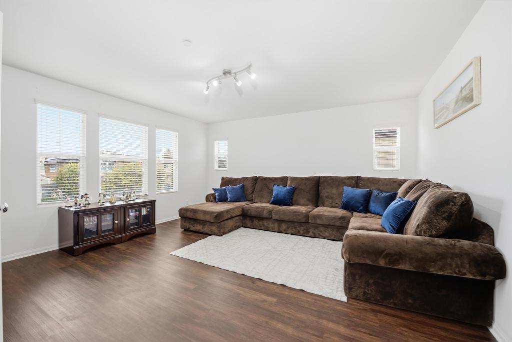 1746 Webber Way Chula Vista, CA 91913 - Photo 13 of 24 a living room with furniture and large windows