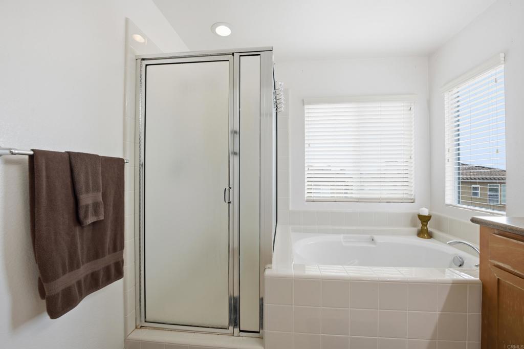 1746 Webber Way Chula Vista, CA 91913 - Photo 16 of 24 a bathroom with a bathtub and a shower
