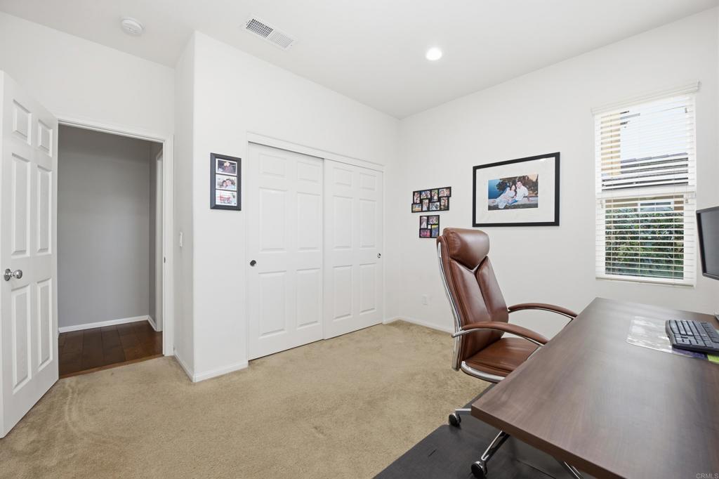 1746 Webber Way Chula Vista, CA 91913 - Photo 3 of 24 a view of a workspace with furniture and a window