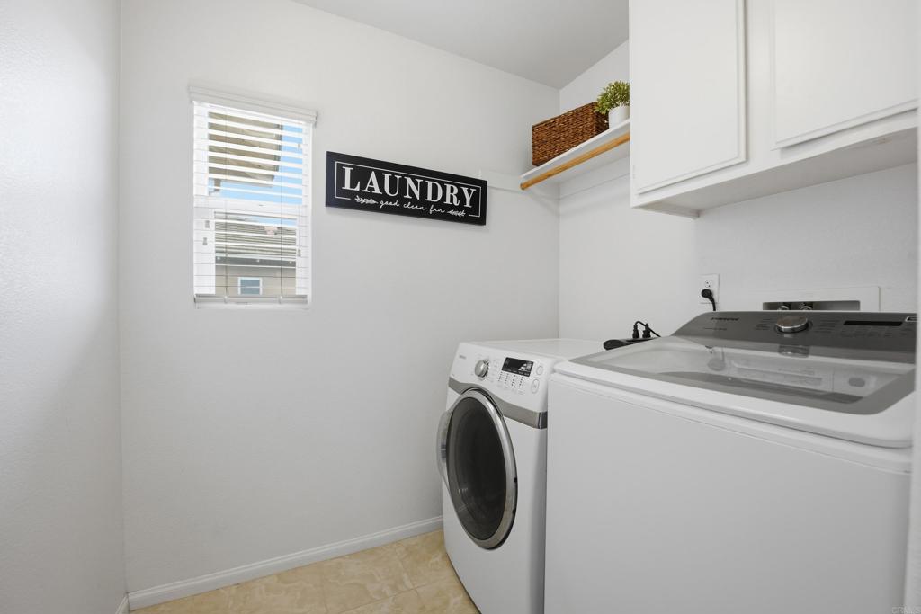 1746 Webber Way Chula Vista, CA 91913 - Photo 8 of 24 a utility room with dryer and washer