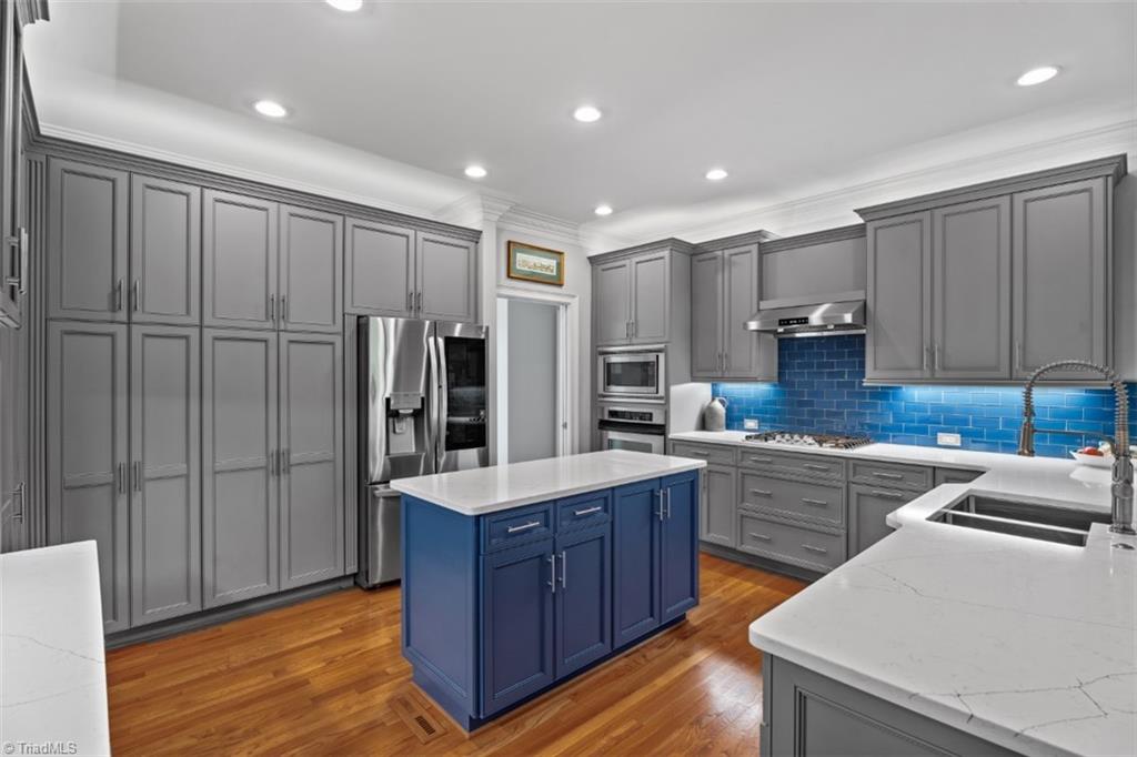 4449 Bent Tree Farm Road Winston-Salem, NC 27106 - Photo 8 of 50 Freshly updated kitchen with modern quartz counters