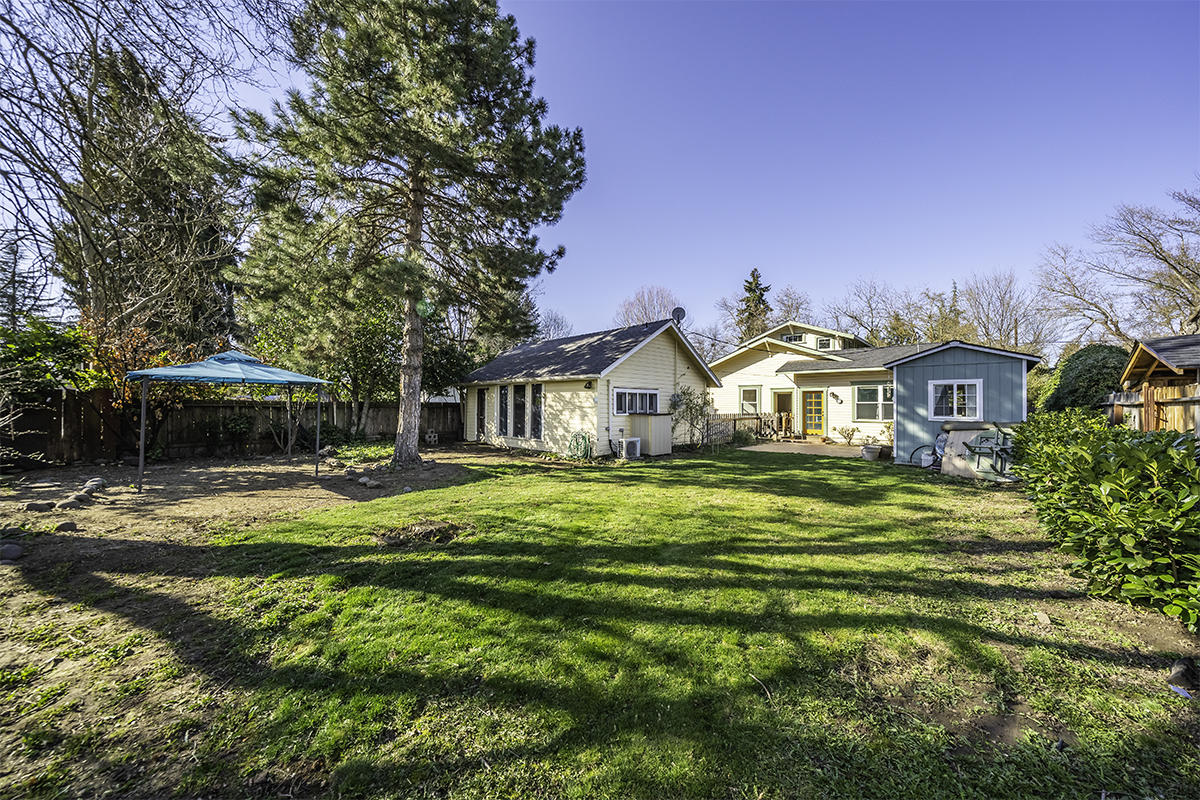 1016 Reddy Avenue Medford, OR 97504 - Photo 31 of 37 a front view of a house with a yard table and chairs