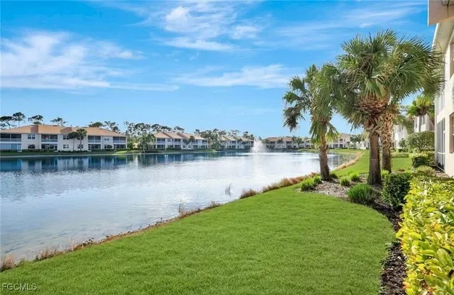 a view of a lake with houses