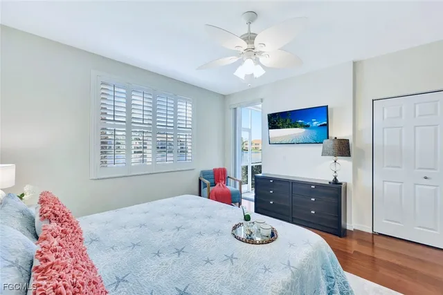 a bedroom with a bed and dresser