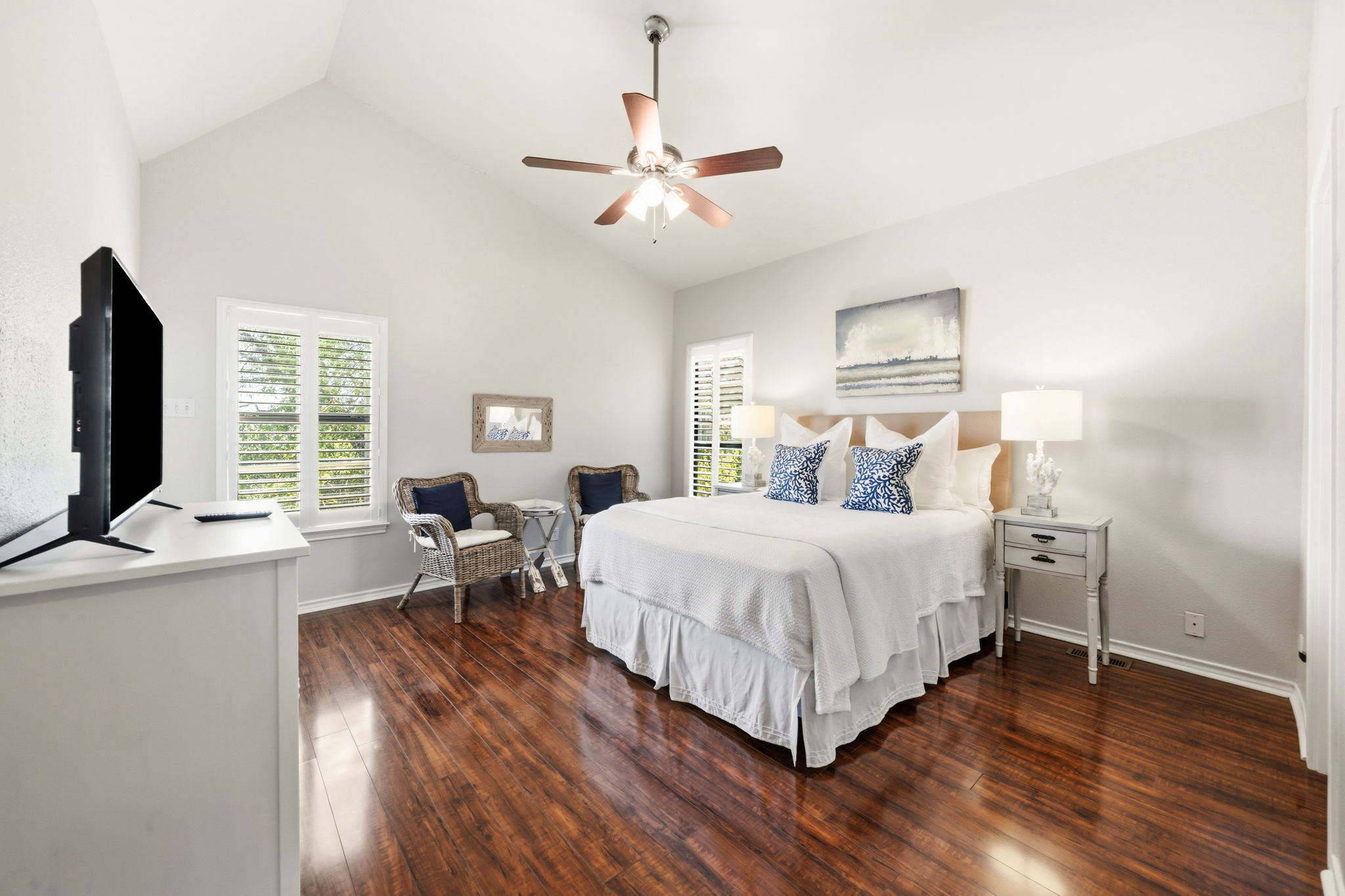 1715 Buffalo Gap Road Austin, TX 78734 - Photo 12 of 18 Rich hardwood floors complement the soaring vaulted ceiling in this airy bedroom retreat.