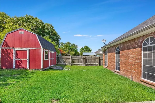 a view of a swimming pool with back yard