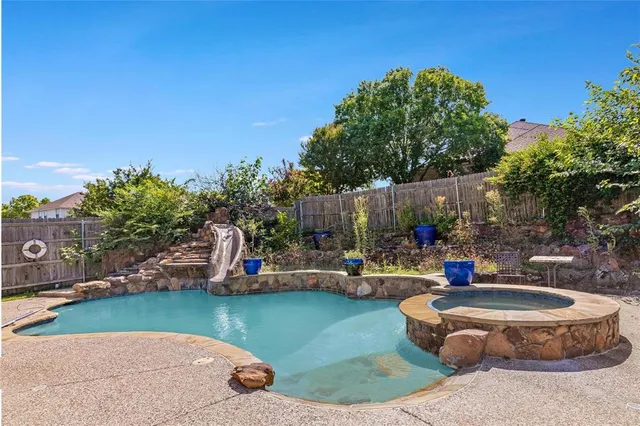 a front view of a house with yard