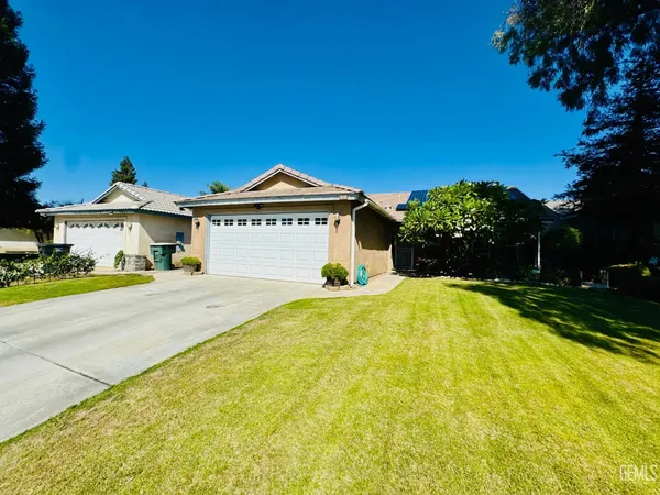 a front view of a house with swimming pool