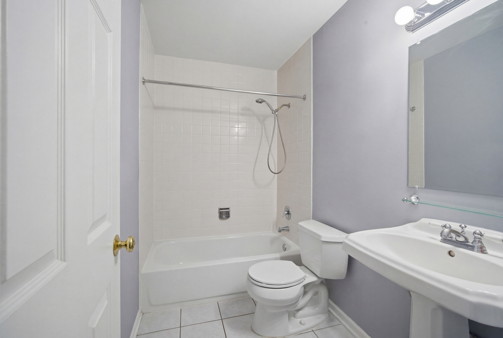 2113 Ammer Ridge Court, Unit 301 Glenview, IL 60025 - Photo 15 of 21 a bathroom with a toilet sink vanity shower and bathtub