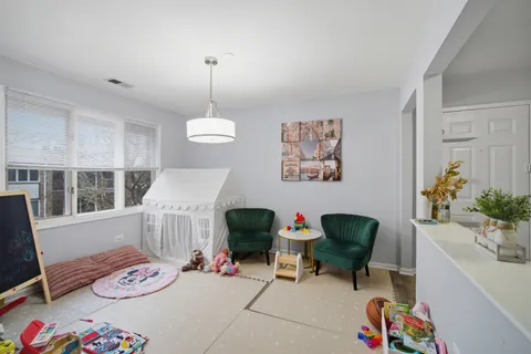 a living room with furniture and decor