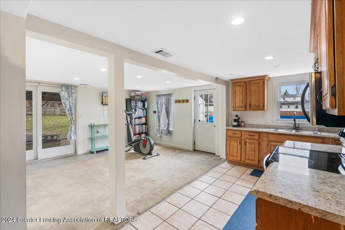 3011 North Aurelius Road Lansing, MI 48910 - Photo 11 of 25 13-Media Jett-21