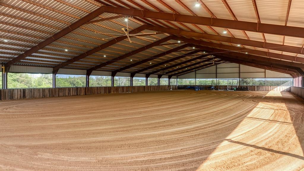 501 Grimes Road Mineral Wells, TX 76067 - Photo 11 of 40 a view of a room with a wooden floor
