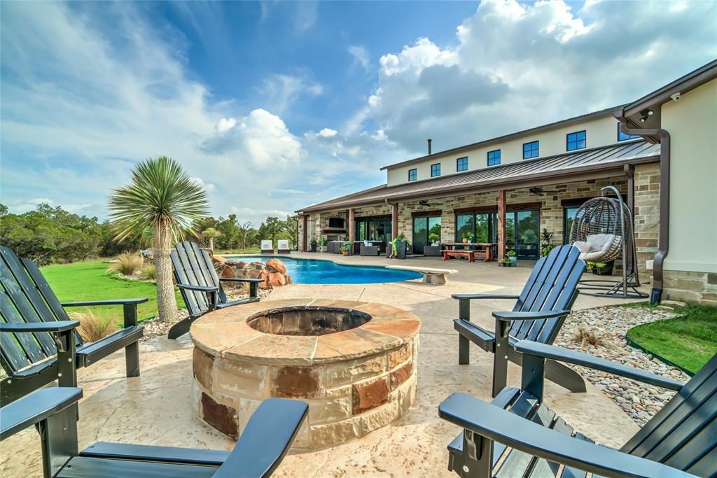501 Grimes Road Mineral Wells, TX 76067 - Photo 16 of 40 a view of swimming pool with seating area and furniture