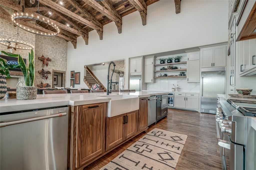 501 Grimes Road Mineral Wells, TX 76067 - Photo 40 of 40 a kitchen with stainless steel appliances a sink and cabinets