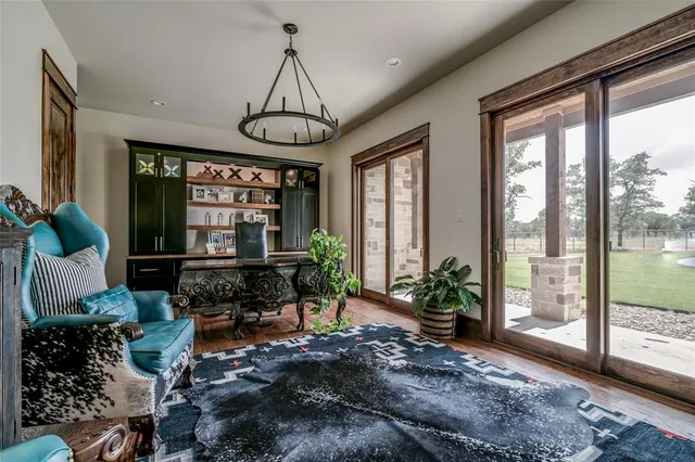 a kitchen with a sink cabinets and window