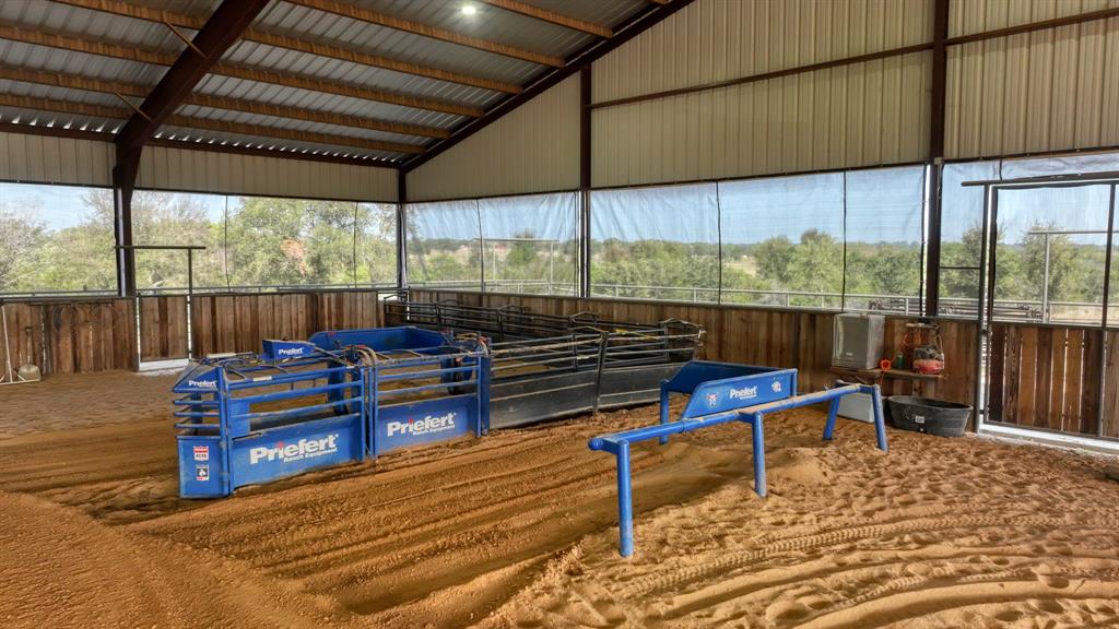 501 Grimes Road Mineral Wells, TX 76067 - Photo 27 of 40 a sitting area with furniture and a wooden deck