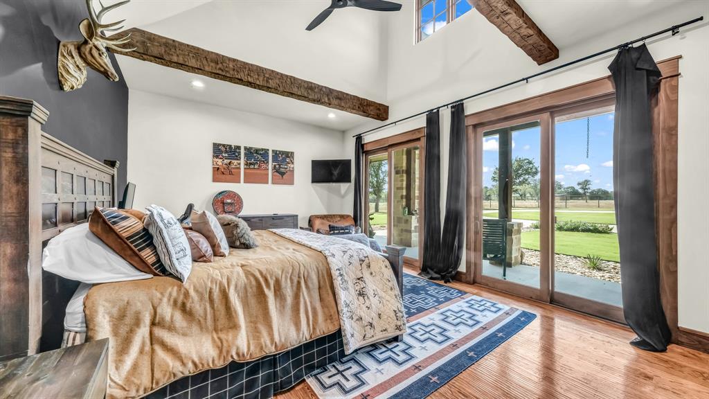 501 Grimes Road Mineral Wells, TX 76067 - Photo 34 of 40 a bed sitting in a bedroom next to a window