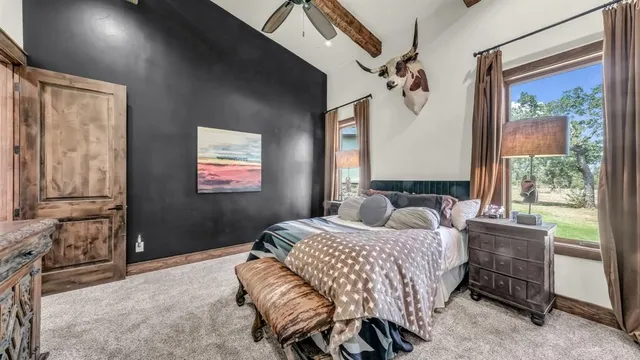a view of a livingroom with furniture and workspace