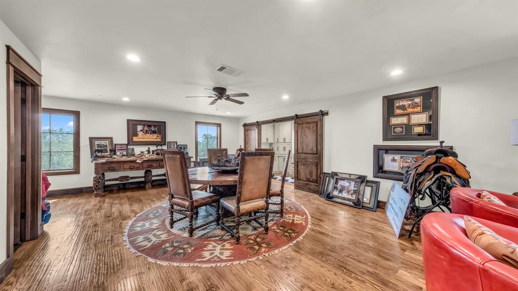 501 Grimes Road Mineral Wells, TX 76067 - Photo 36 of 40 a living room with furniture and a wooden floor