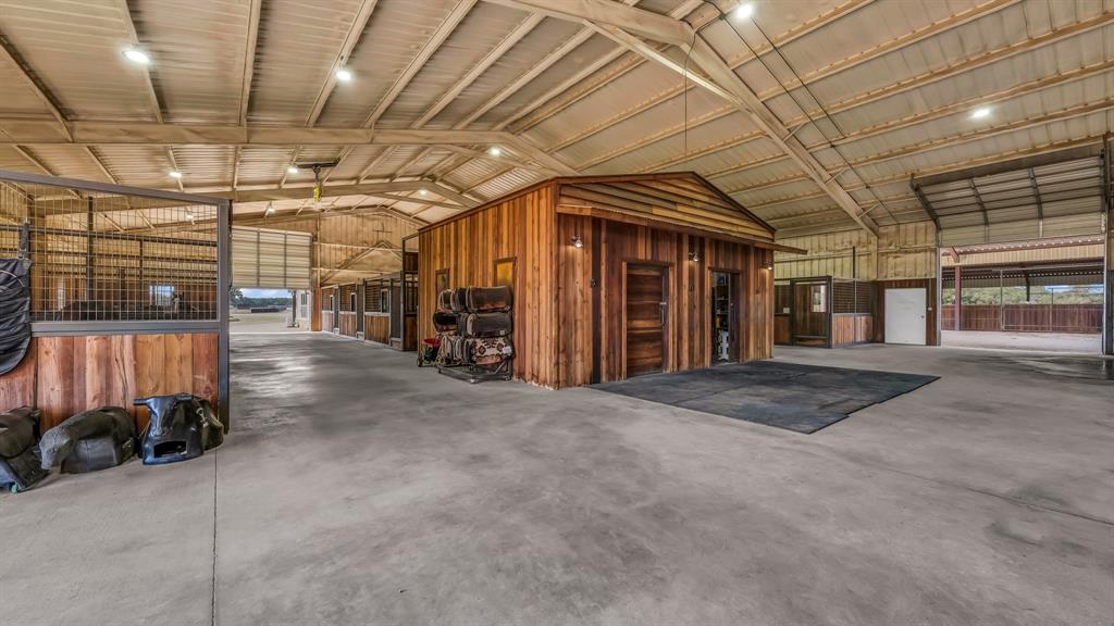 501 Grimes Road Mineral Wells, TX 76067 - Photo 6 of 40 a view of a hallway with wooden roof