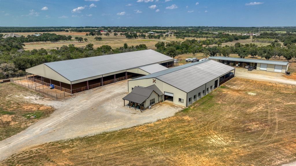 501 Grimes Road Mineral Wells, TX 76067 - Photo 7 of 40 an aerial view of a house with a yard