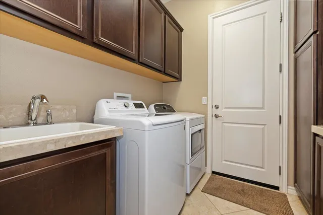 a view of a swimming pool with outdoor seating