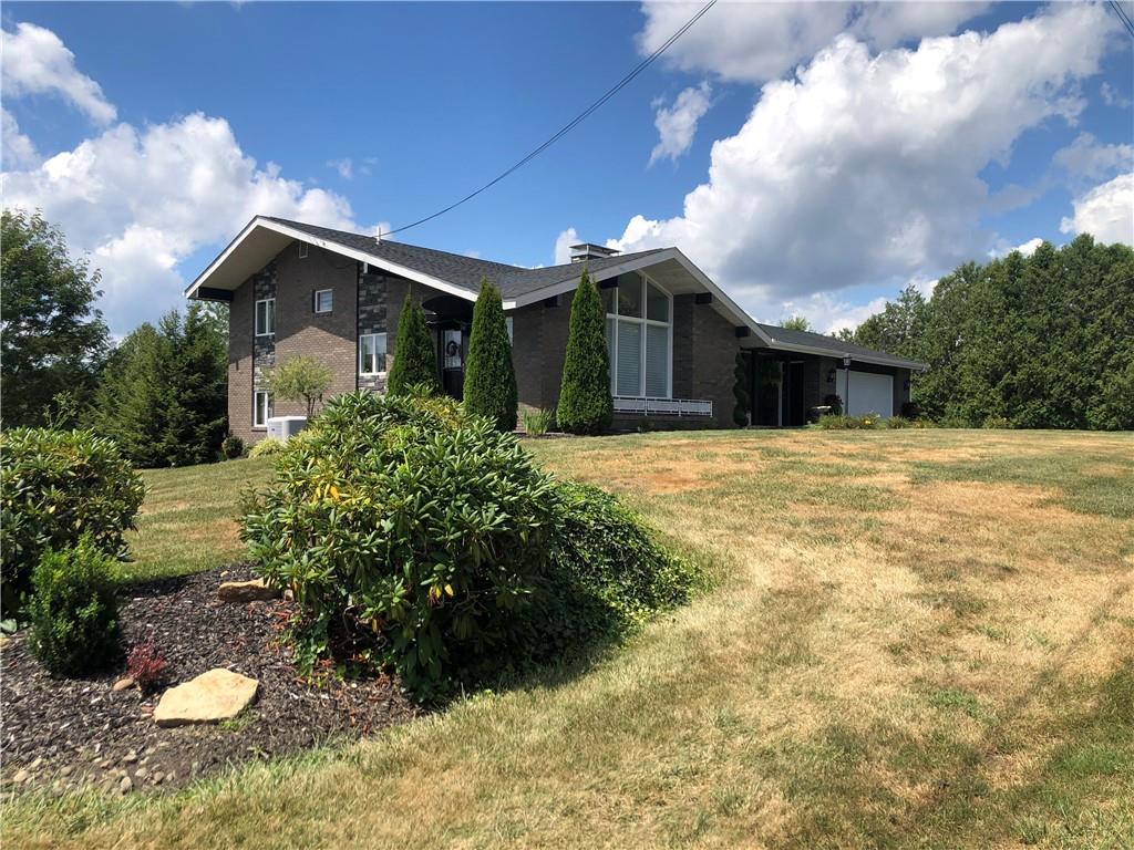107 Spring Lane Uniontown, PA 15401 - Photo 1 of 50 a view of a house with a yard