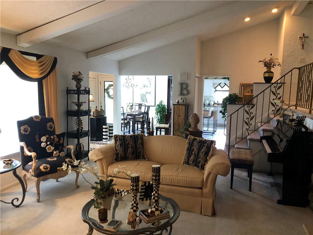 107 Spring Lane Uniontown, PA 15401 - Photo 11 of 50 a living room with furniture and a floor to ceiling window