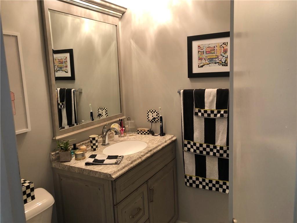 107 Spring Lane Uniontown, PA 15401 - Photo 24 of 50 a bathroom with a sink vanity and a mirror