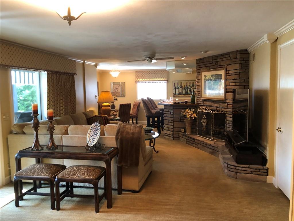 107 Spring Lane Uniontown, PA 15401 - Photo 28 of 50 a living room with furniture and a flat screen tv