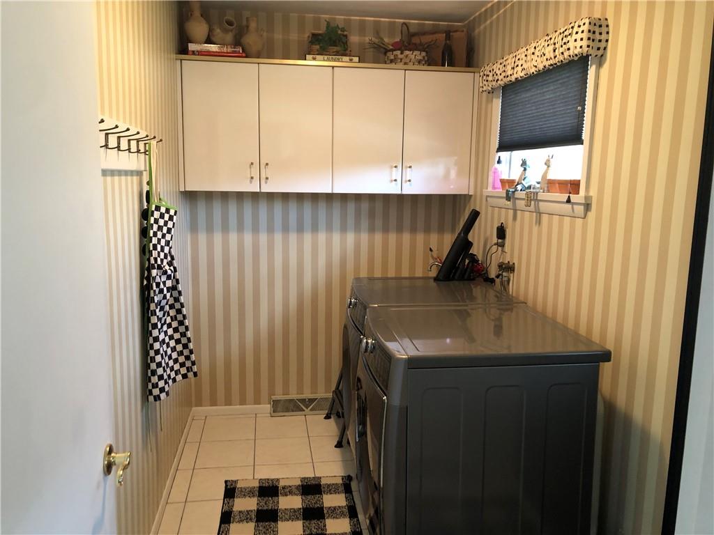 107 Spring Lane Uniontown, PA 15401 - Photo 35 of 50 a bathroom with a sink and a mirror