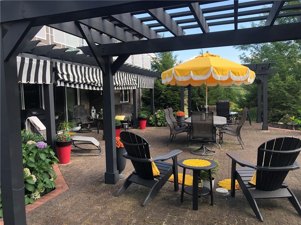 107 Spring Lane Uniontown, PA 15401 - Photo 37 of 50 a view of a chairs and table in a patio
