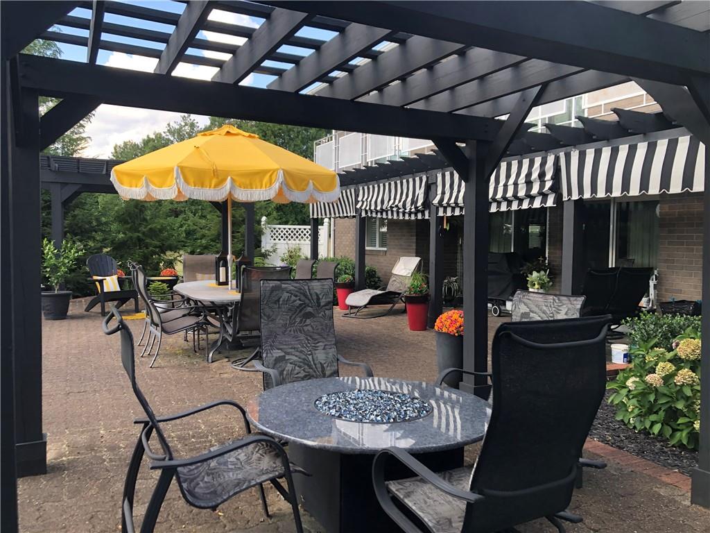 107 Spring Lane Uniontown, PA 15401 - Photo 38 of 50 a view of a dinning table and chairs in patio