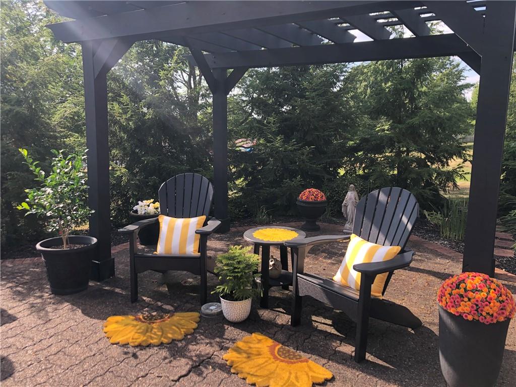 107 Spring Lane Uniontown, PA 15401 - Photo 41 of 50 a view of a chairs and table in the patio
