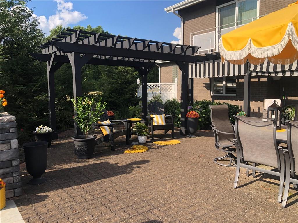 107 Spring Lane Uniontown, PA 15401 - Photo 42 of 50 a view of a chairs and tables in the patio