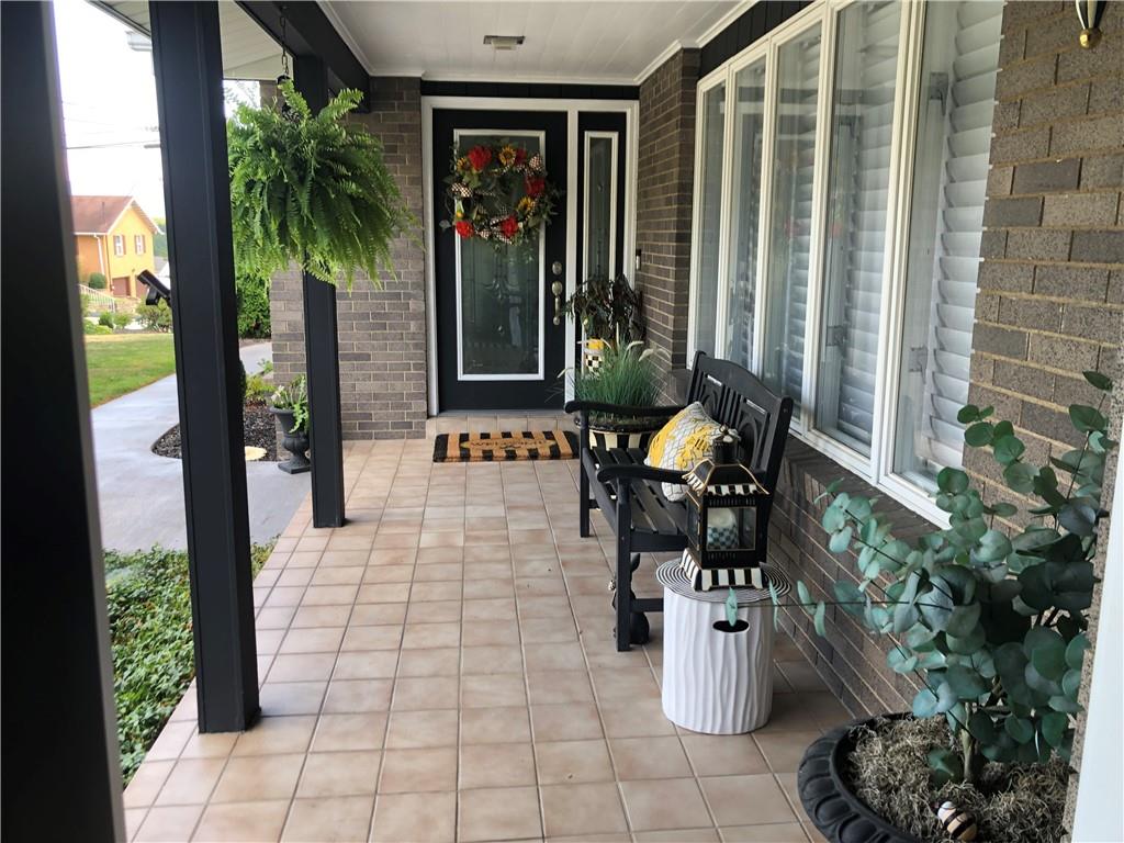 107 Spring Lane Uniontown, PA 15401 - Photo 5 of 50 a lobby with furniture and potted plants